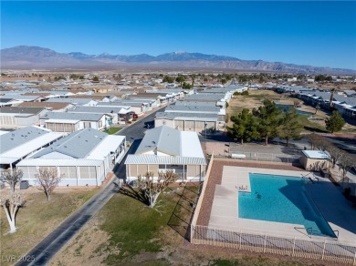 Discover this beautifully maintained manufactured home in the on Desert Greens Golf Course in Nevada - for sale on GolfHomes.com, golf home, golf lot