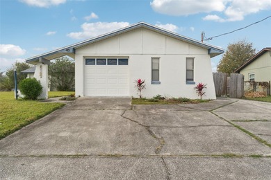 Welcome to your dream home, beautifully nestled on an oversized on Palm Harbor Golf Club in Florida - for sale on GolfHomes.com, golf home, golf lot