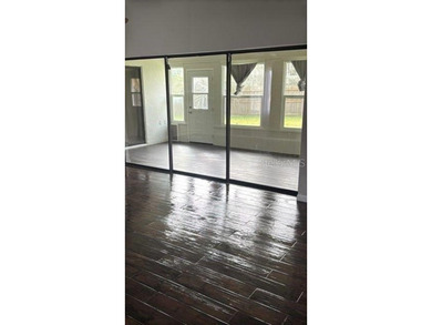 Welcome to your dream home, beautifully nestled on an oversized on Palm Harbor Golf Club in Florida - for sale on GolfHomes.com, golf home, golf lot