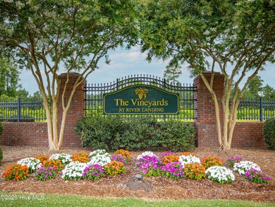 Imagine waking up each morning to peaceful water views and the on River Landing Golf Course in North Carolina - for sale on GolfHomes.com, golf home, golf lot