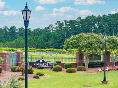 Imagine waking up each morning to peaceful water views and the on River Landing Golf Course in North Carolina - for sale on GolfHomes.com, golf home, golf lot