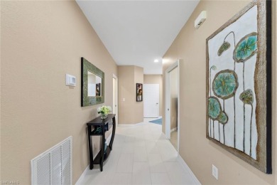 Experience resort-style living in this stunning 2-bedroom on Estero Country Club in Florida - for sale on GolfHomes.com, golf home, golf lot