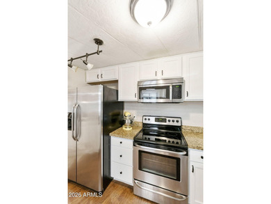 Beautifully updated 2BR, 2BA home on a rare large double corner on Sun Lakes Country Club in Arizona - for sale on GolfHomes.com, golf home, golf lot