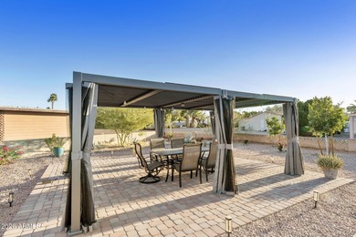 Beautifully updated 2BR, 2BA home on a rare large double corner on Sun Lakes Country Club in Arizona - for sale on GolfHomes.com, golf home, golf lot