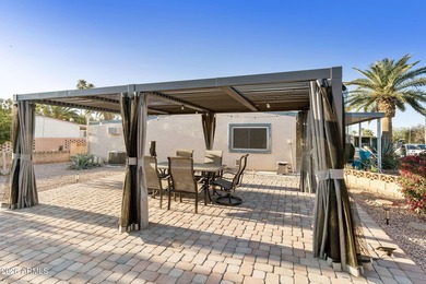 Beautifully updated 2BR, 2BA home on a rare large double corner on Sun Lakes Country Club in Arizona - for sale on GolfHomes.com, golf home, golf lot