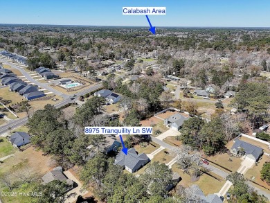 This stunning 3 bedroom, 2 bathroom, custom-built, one-story on Oyster Bay Golf Links in North Carolina - for sale on GolfHomes.com, golf home, golf lot