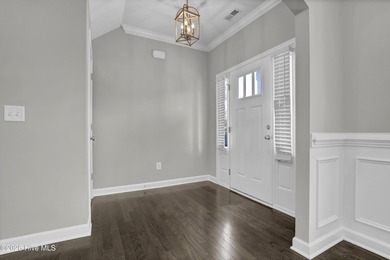 Welcome to this southern charmer home equipped with energy on Olde Point Golf and Country Club in North Carolina - for sale on GolfHomes.com, golf home, golf lot