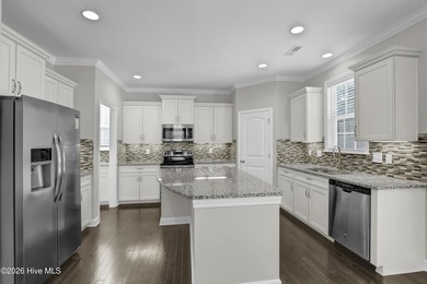 Welcome to this southern charmer home equipped with energy on Olde Point Golf and Country Club in North Carolina - for sale on GolfHomes.com, golf home, golf lot