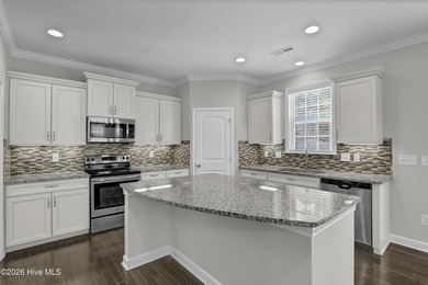 Welcome to this southern charmer home equipped with energy on Olde Point Golf and Country Club in North Carolina - for sale on GolfHomes.com, golf home, golf lot