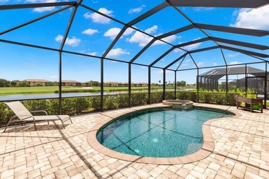 Stunning 4-bed, 2-bath home in renowned River Strand Golf and on River Strand Golf and Country Club At Heritage Harbour  in Florida - for sale on GolfHomes.com, golf home, golf lot