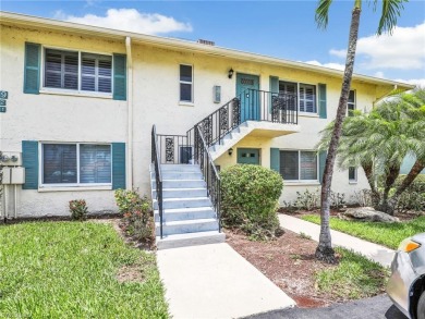 Discover this charming 2-bedroom, 2-bath waterfront home on The Glades Golf and Country Club in Florida - for sale on GolfHomes.com, golf home, golf lot