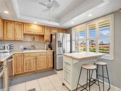 Discover this charming 2-bedroom, 2-bath waterfront home on The Glades Golf and Country Club in Florida - for sale on GolfHomes.com, golf home, golf lot