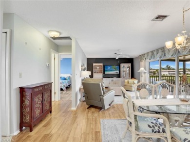 Discover this charming 2-bedroom, 2-bath waterfront home on The Glades Golf and Country Club in Florida - for sale on GolfHomes.com, golf home, golf lot