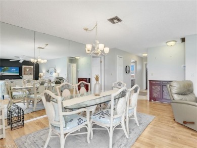 Discover this charming 2-bedroom, 2-bath waterfront home on The Glades Golf and Country Club in Florida - for sale on GolfHomes.com, golf home, golf lot