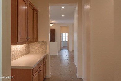 Experience resort-style living in the highly sought-after Corte on Corte Bella Golf Club in Arizona - for sale on GolfHomes.com, golf home, golf lot