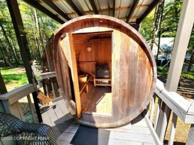 Experience the ultimate POCONO RETREAT!! This stunning raised on The Hideout Golf in Pennsylvania - for sale on GolfHomes.com, golf home, golf lot