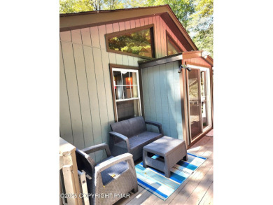 Experience the ultimate POCONO RETREAT!! This stunning raised on The Hideout Golf in Pennsylvania - for sale on GolfHomes.com, golf home, golf lot