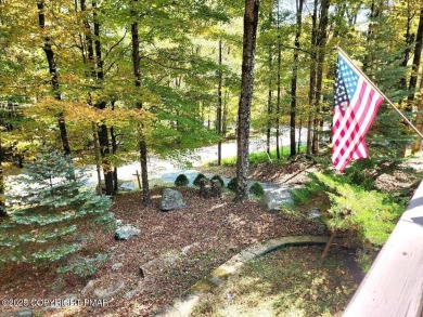 Experience the ultimate POCONO RETREAT!! This stunning raised on The Hideout Golf in Pennsylvania - for sale on GolfHomes.com, golf home, golf lot