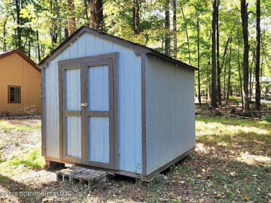 Experience the ultimate POCONO RETREAT!! This stunning raised on The Hideout Golf in Pennsylvania - for sale on GolfHomes.com, golf home, golf lot