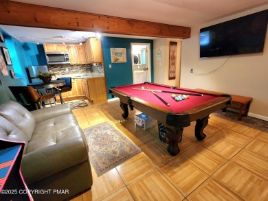 Experience the ultimate POCONO RETREAT!! This stunning raised on The Hideout Golf in Pennsylvania - for sale on GolfHomes.com, golf home, golf lot