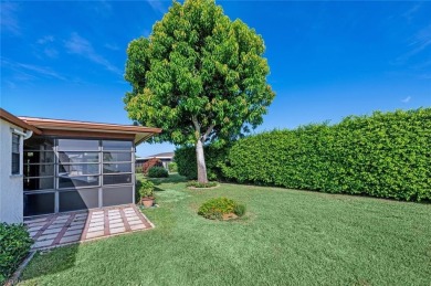 This pristine 2BR/2BA home is situated on a quiet cul-se-sac and on Riviera Golf Club in Florida - for sale on GolfHomes.com, golf home, golf lot