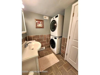 Experience the ultimate POCONO RETREAT!! This stunning raised on The Hideout Golf in Pennsylvania - for sale on GolfHomes.com, golf home, golf lot