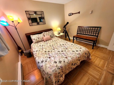 Experience the ultimate POCONO RETREAT!! This stunning raised on The Hideout Golf in Pennsylvania - for sale on GolfHomes.com, golf home, golf lot