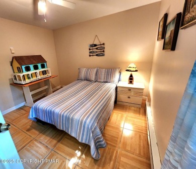 Experience the ultimate POCONO RETREAT!! This stunning raised on The Hideout Golf in Pennsylvania - for sale on GolfHomes.com, golf home, golf lot