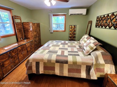 Experience the ultimate POCONO RETREAT!! This stunning raised on The Hideout Golf in Pennsylvania - for sale on GolfHomes.com, golf home, golf lot