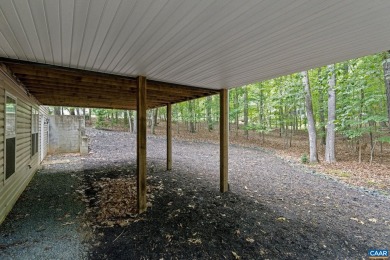 Custom ranch in Lake Monticello featuring vaulted ceilings on Lake Monticello Golf Course in Virginia - for sale on GolfHomes.com, golf home, golf lot
