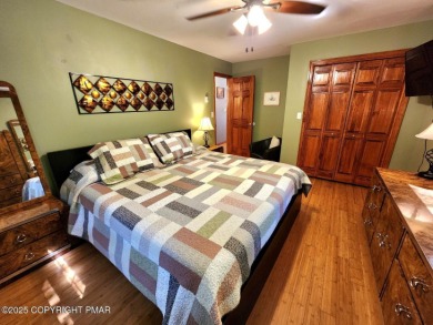 Experience the ultimate POCONO RETREAT!! This stunning raised on The Hideout Golf in Pennsylvania - for sale on GolfHomes.com, golf home, golf lot