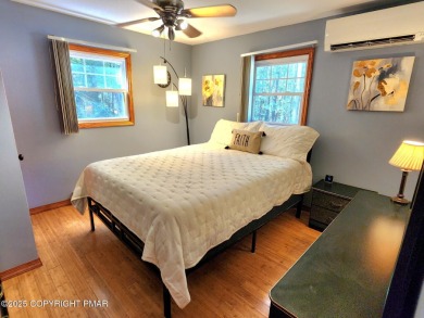 Experience the ultimate POCONO RETREAT!! This stunning raised on The Hideout Golf in Pennsylvania - for sale on GolfHomes.com, golf home, golf lot