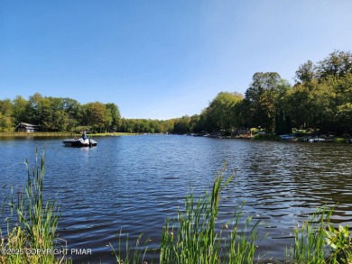 Experience the ultimate POCONO RETREAT!! This stunning raised on The Hideout Golf in Pennsylvania - for sale on GolfHomes.com, golf home, golf lot