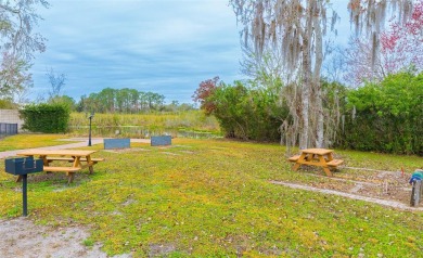 Experience the perfect mix of comfort, security, and on The Groves Golf and Country Club in Florida - for sale on GolfHomes.com, golf home, golf lot