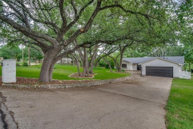 This charming home offers 1,832 sq ft of comfortable living on De Cordova Bend Country Club in Texas - for sale on GolfHomes.com, golf home, golf lot