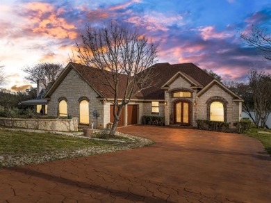 This stunning home is inside a secured gated community that is on White Bluff Resort - Old Course in Texas - for sale on GolfHomes.com, golf home, golf lot