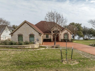 This stunning home is inside a secured gated community that is on White Bluff Resort - Old Course in Texas - for sale on GolfHomes.com, golf home, golf lot