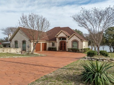 This stunning home is inside a secured gated community that is on White Bluff Resort - Old Course in Texas - for sale on GolfHomes.com, golf home, golf lot