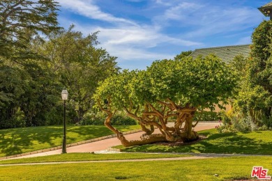 Located on one of the most desirable streets in all of Los on Los Angeles Country Club in California - for sale on GolfHomes.com, golf home, golf lot