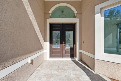 Lakes of the Lady Lake - This stunning new construction home on Lakes of Lady Lake Golf Course in Florida - for sale on GolfHomes.com, golf home, golf lot