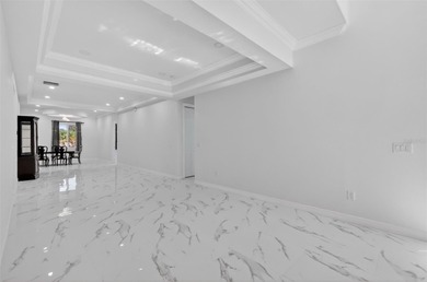 Lakes of the Lady Lake - This stunning new construction home on Lakes of Lady Lake Golf Course in Florida - for sale on GolfHomes.com, golf home, golf lot