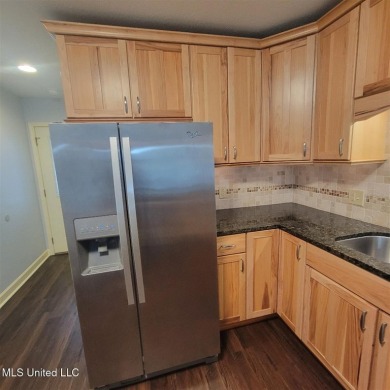 Modern single-family home for sale in Diamondhead, MS!-Luxury on Diamondhead Country Club in Mississippi - for sale on GolfHomes.com, golf home, golf lot