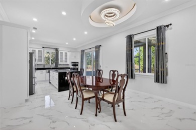 Lakes of the Lady Lake - This stunning new construction home on Lakes of Lady Lake Golf Course in Florida - for sale on GolfHomes.com, golf home, golf lot