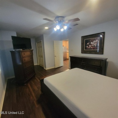 Modern single-family home for sale in Diamondhead, MS!-Luxury on Diamondhead Country Club in Mississippi - for sale on GolfHomes.com, golf home, golf lot