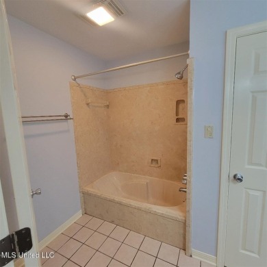 Modern single-family home for sale in Diamondhead, MS!-Luxury on Diamondhead Country Club in Mississippi - for sale on GolfHomes.com, golf home, golf lot