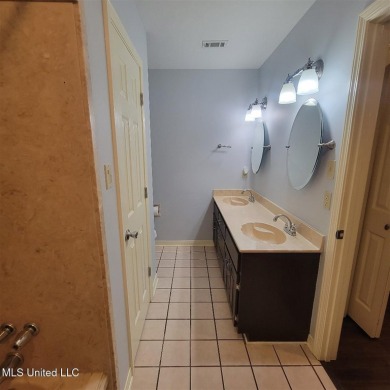 Modern single-family home for sale in Diamondhead, MS!-Luxury on Diamondhead Country Club in Mississippi - for sale on GolfHomes.com, golf home, golf lot