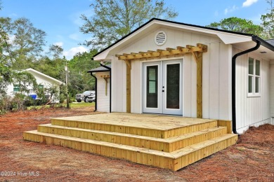 This beautifully renovated single-story home offers a modern on The Lakes Country Club in North Carolina - for sale on GolfHomes.com, golf home, golf lot