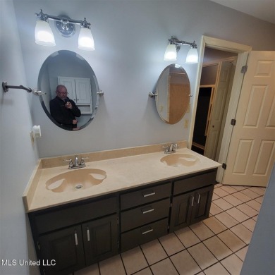 Modern single-family home for sale in Diamondhead, MS!-Luxury on Diamondhead Country Club in Mississippi - for sale on GolfHomes.com, golf home, golf lot