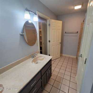 Modern single-family home for sale in Diamondhead, MS!-Luxury on Diamondhead Country Club in Mississippi - for sale on GolfHomes.com, golf home, golf lot
