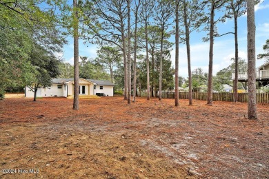 This beautifully renovated single-story home offers a modern on The Lakes Country Club in North Carolina - for sale on GolfHomes.com, golf home, golf lot